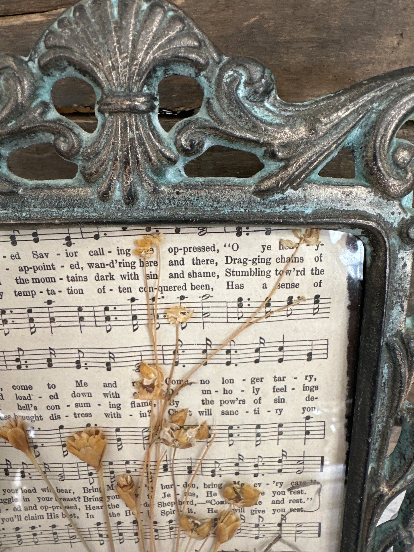 Dried floral/music sheet framed