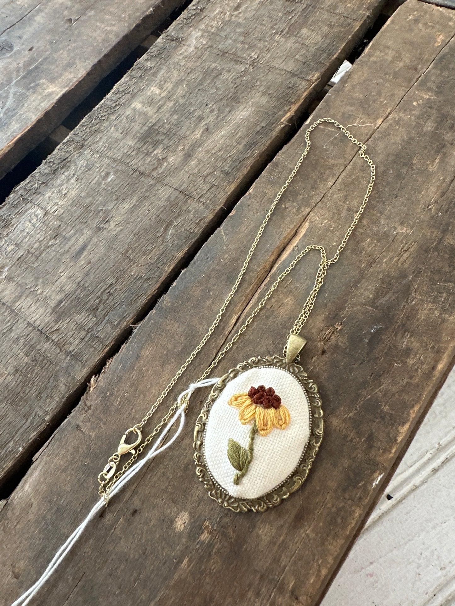 Hand embroidered necklace- single yellow flower