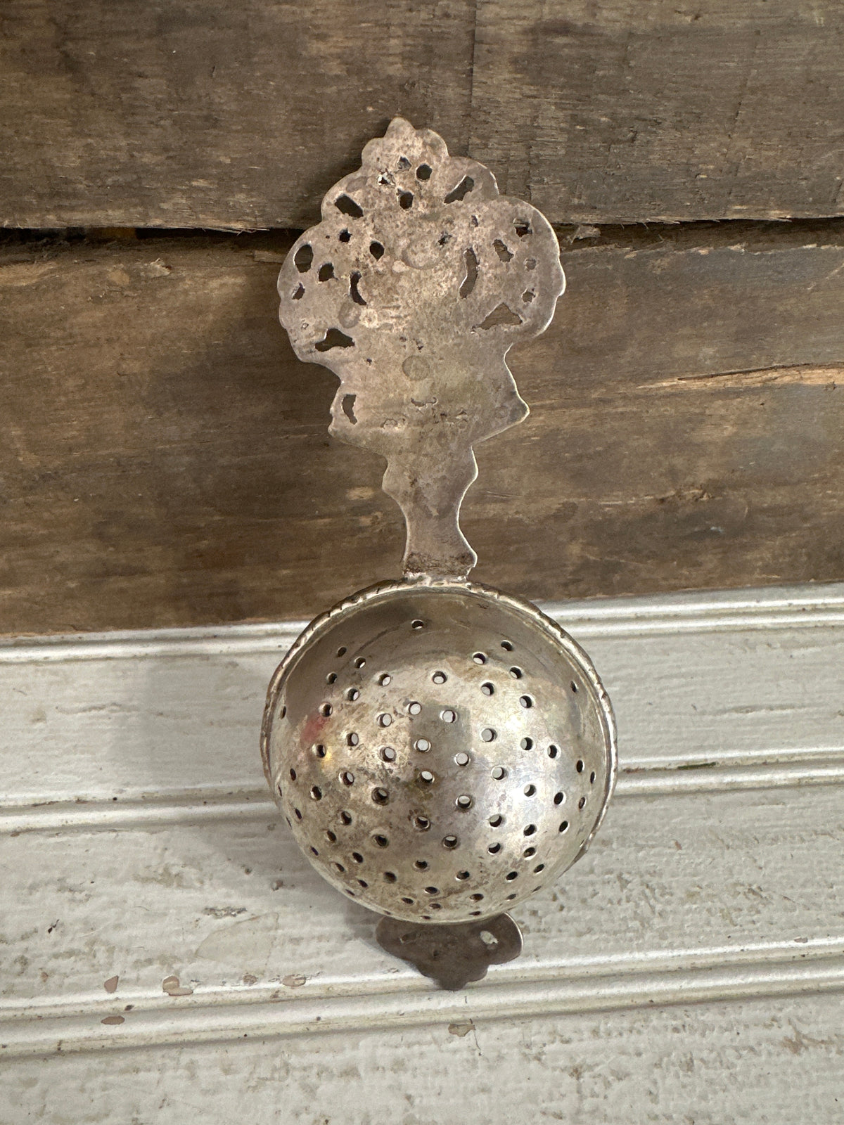 Antique tea strainer
