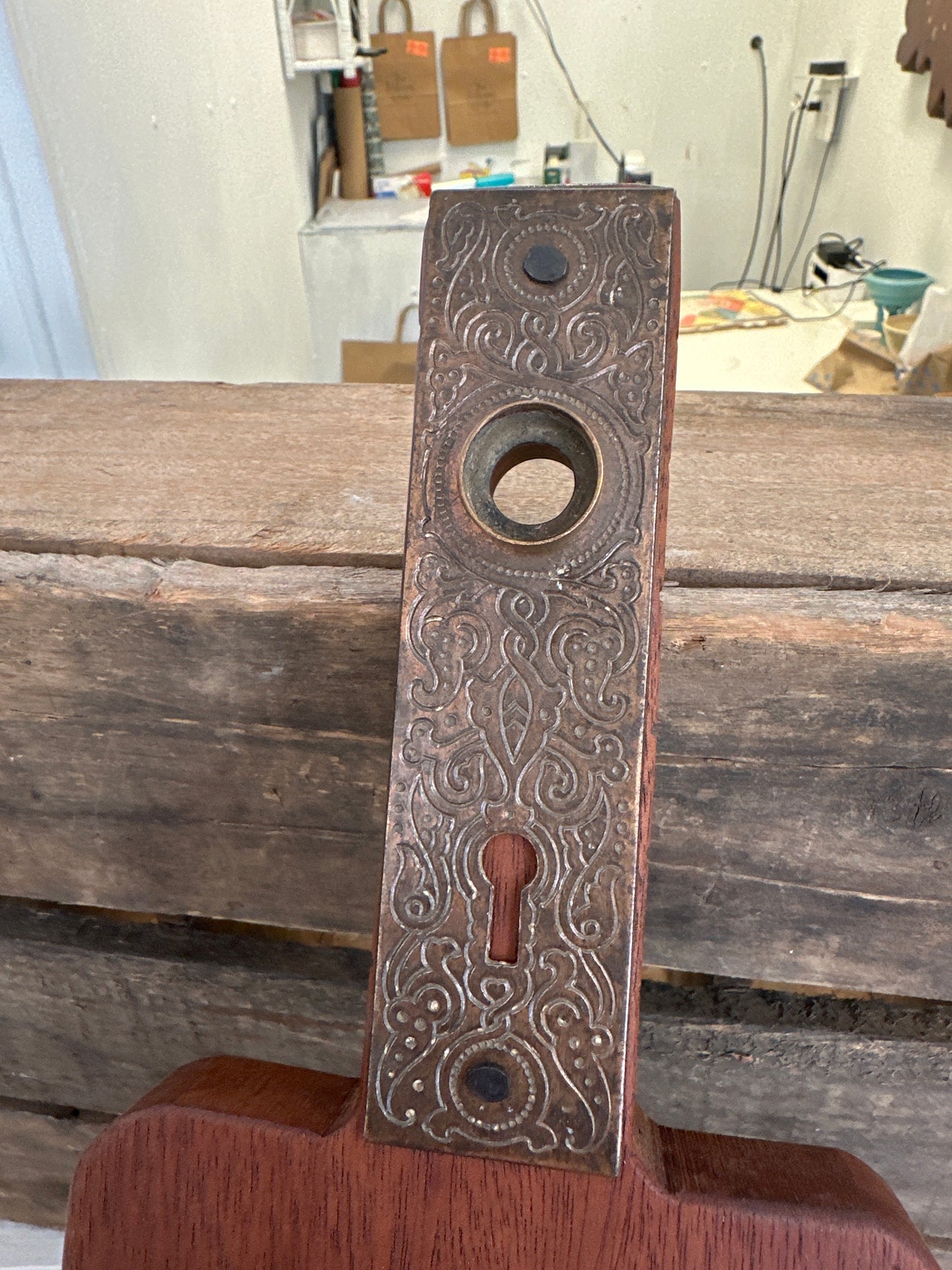 Handmade cutting/charcuterie board with metal vintage door faceplate