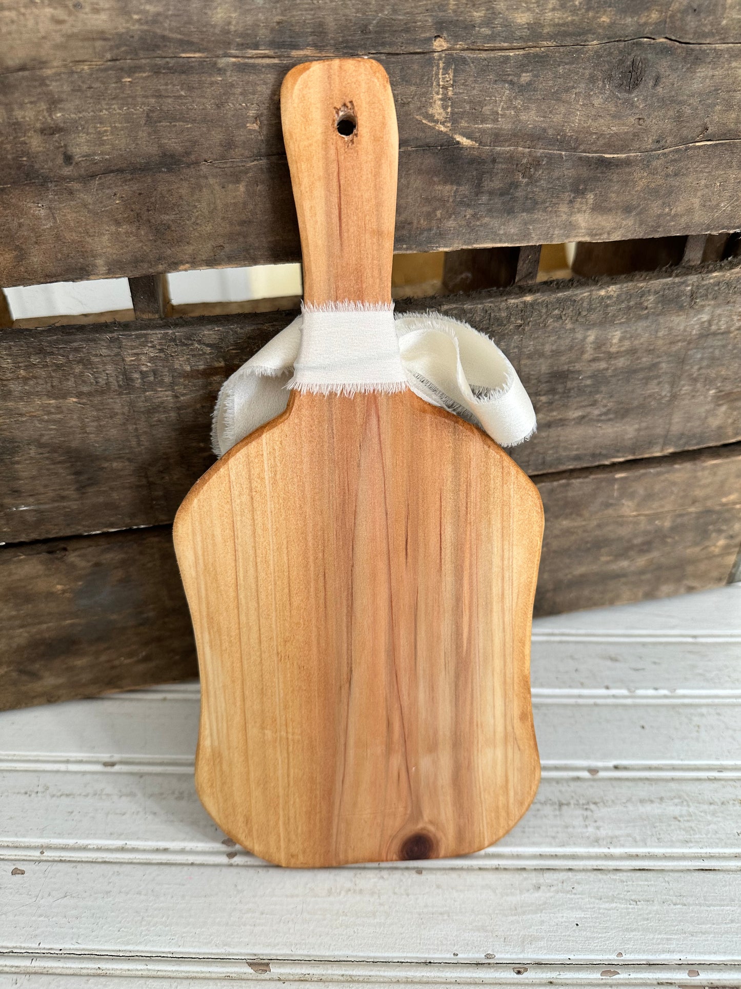 Handmade wood bread board with silver plate butter knife