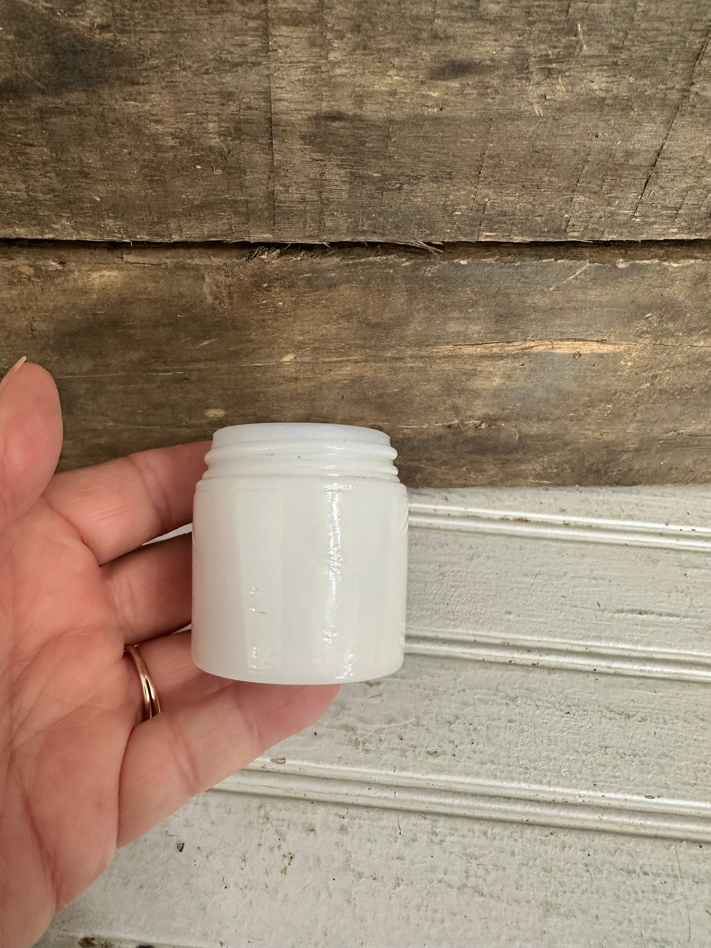 Jergens milk glass jar