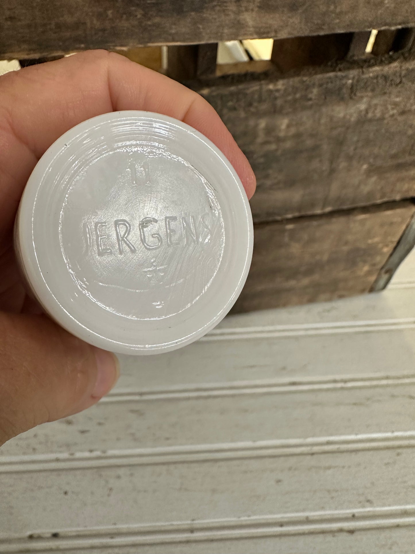 Jergens milk glass jar