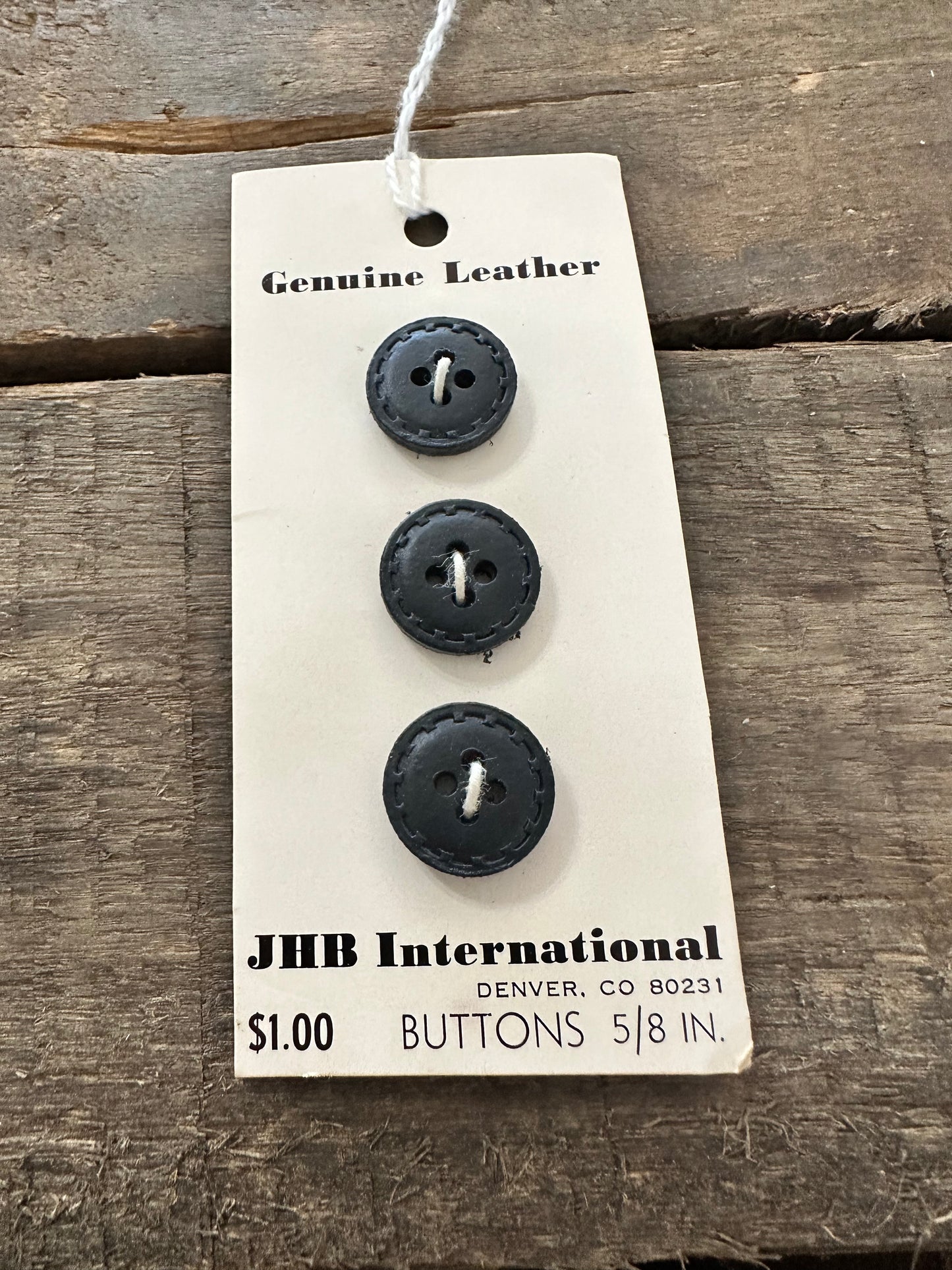 JHB International buttons