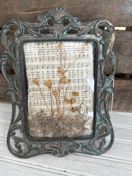 Dried floral/music sheet framed