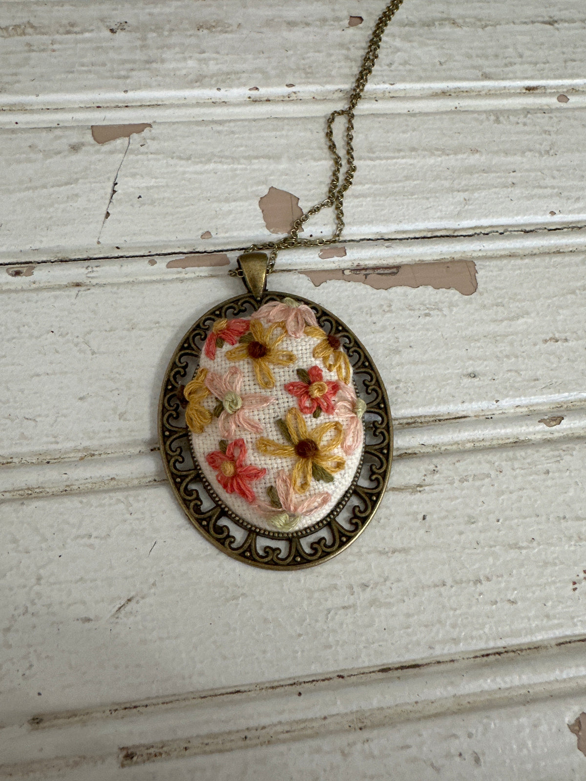 Hand embroidered necklace- lazy daisy