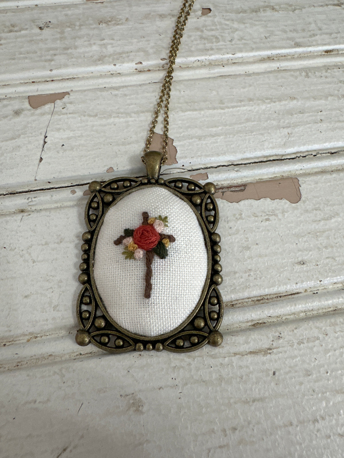 Hand embroidered floral cross necklace