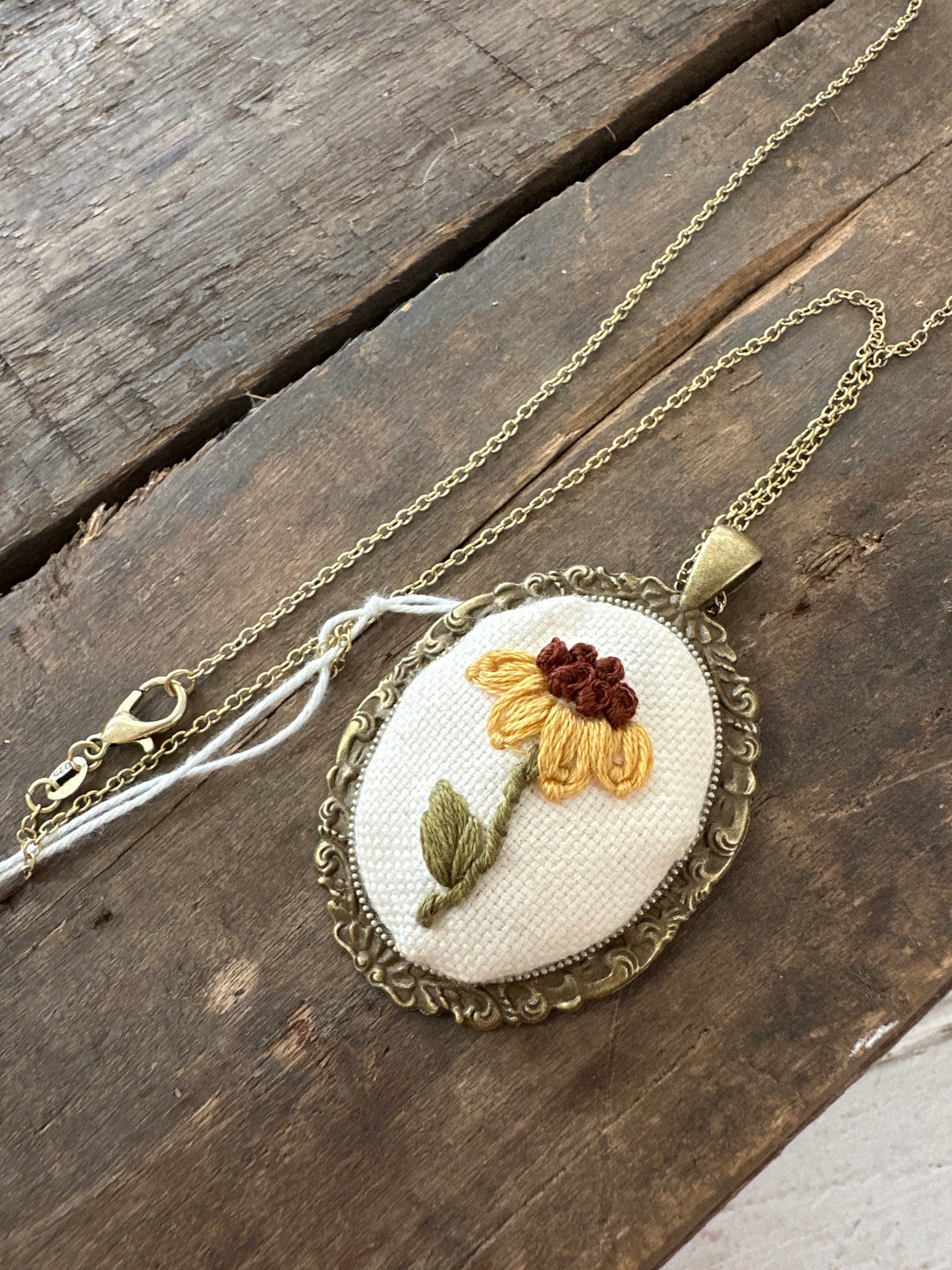 Hand embroidered necklace- single yellow flower