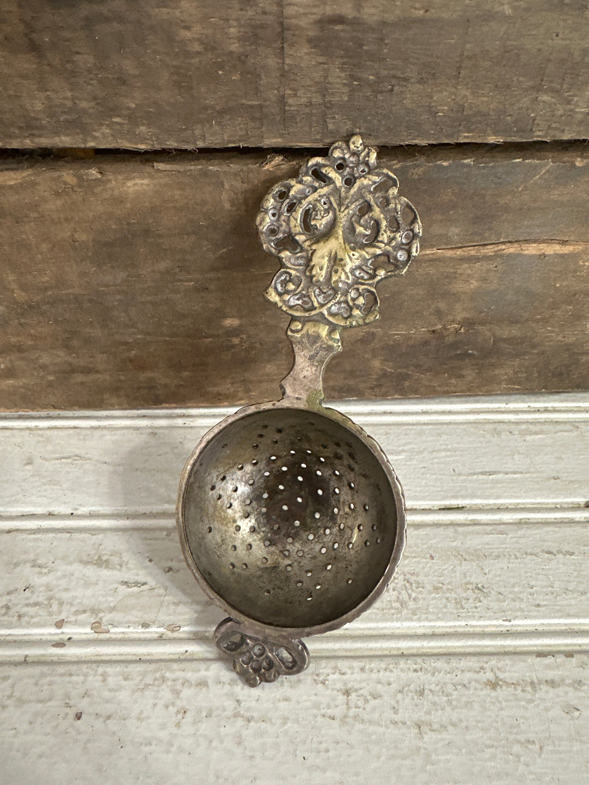 Antique tea strainer