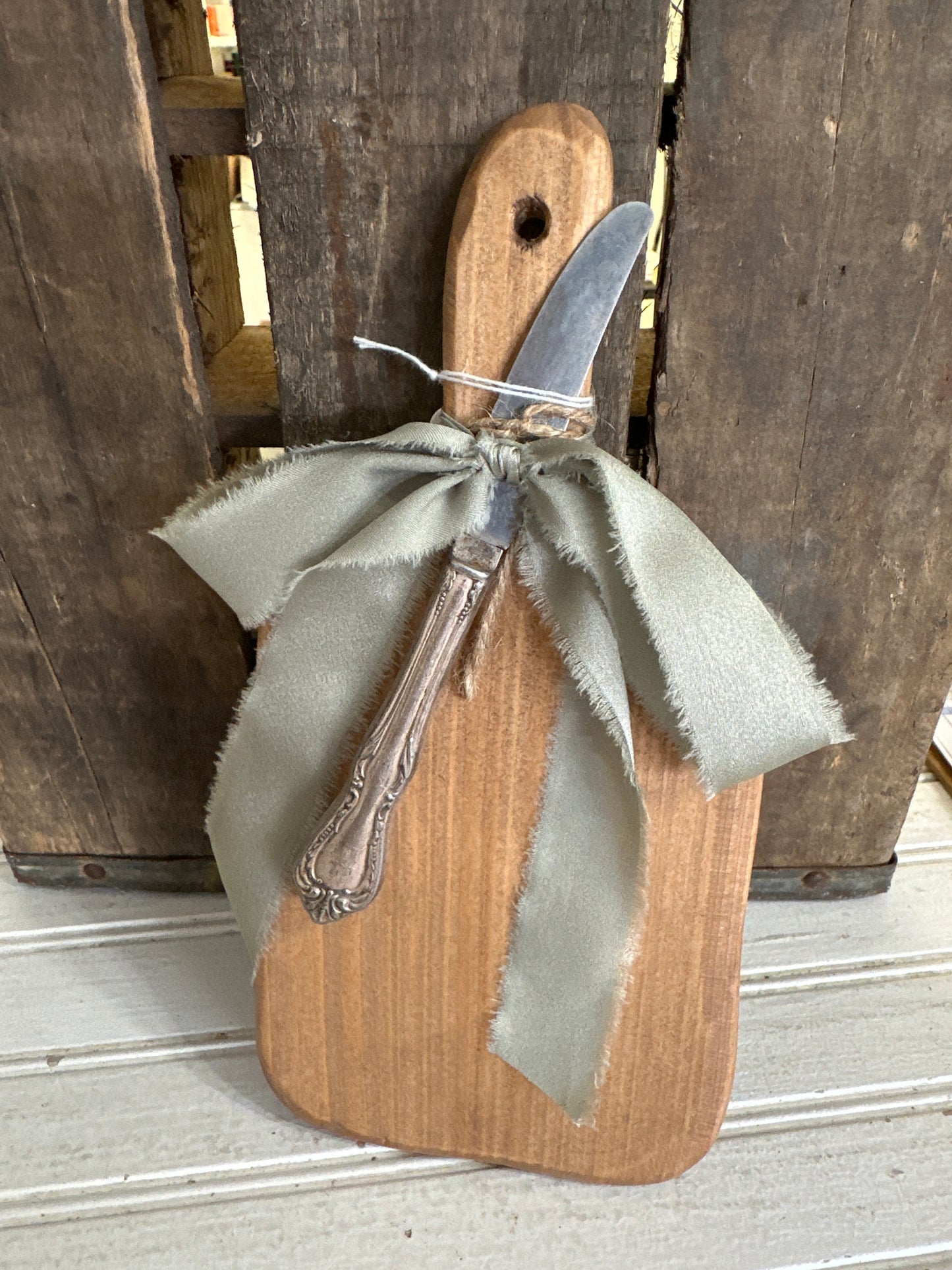 Handmade board with vintage butter knife