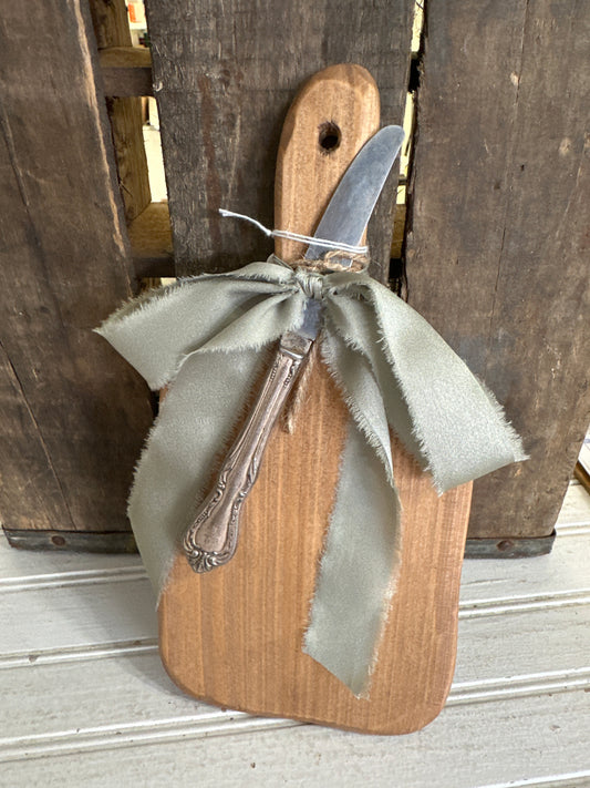 Handmade board with vintage butter knife