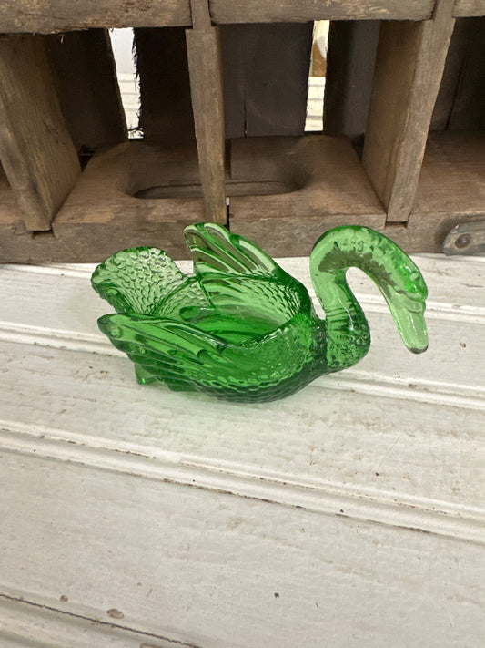 Green glass swan