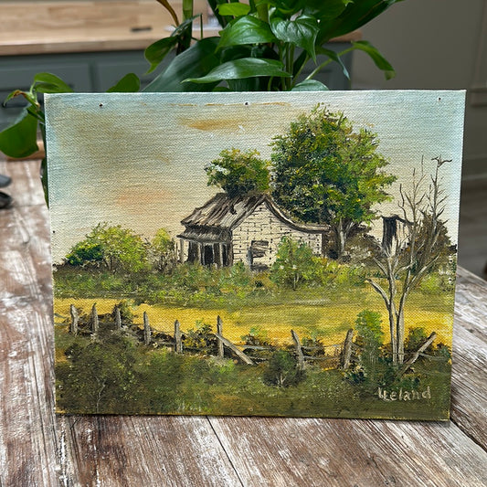 Home with outhouse wall art