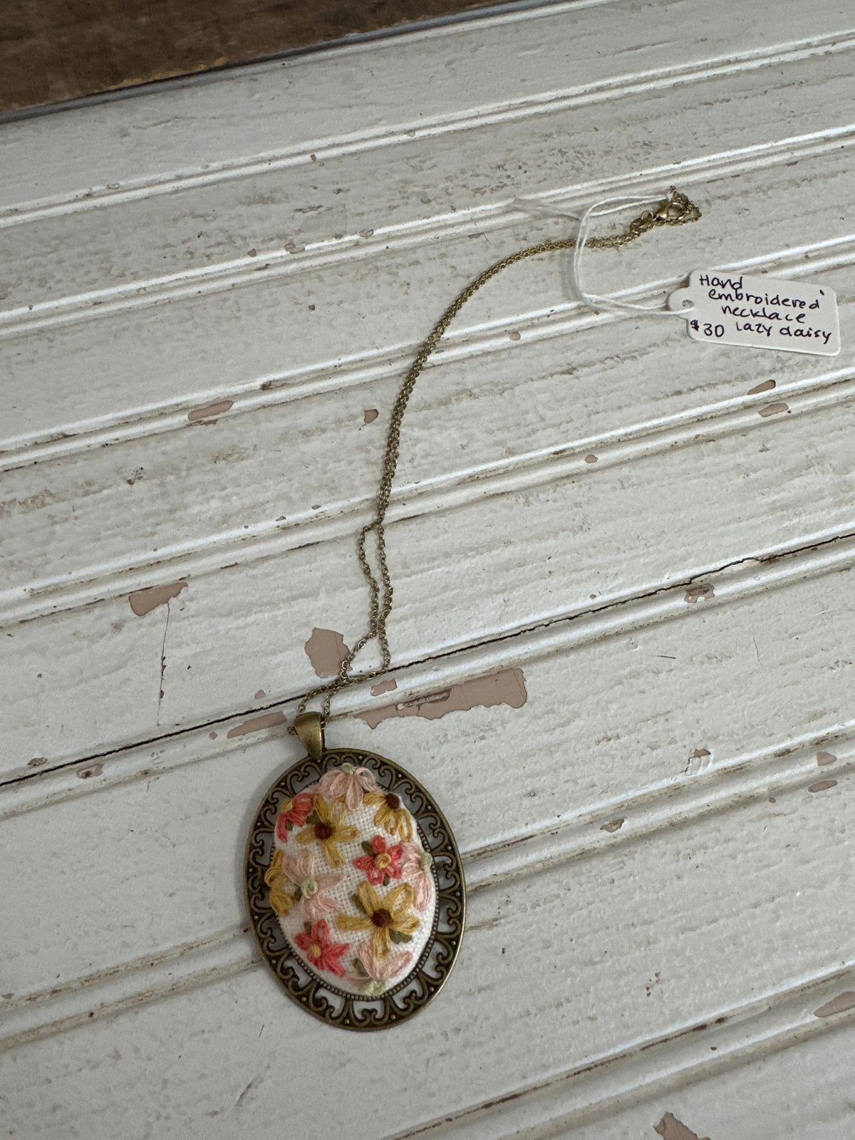 Hand embroidered necklace- lazy daisy