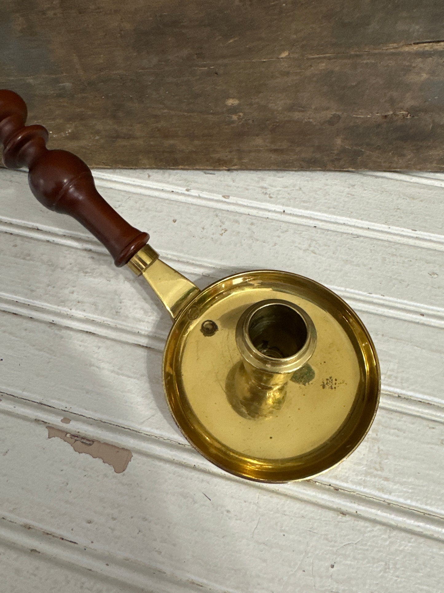 Brass candle holder with wood handle