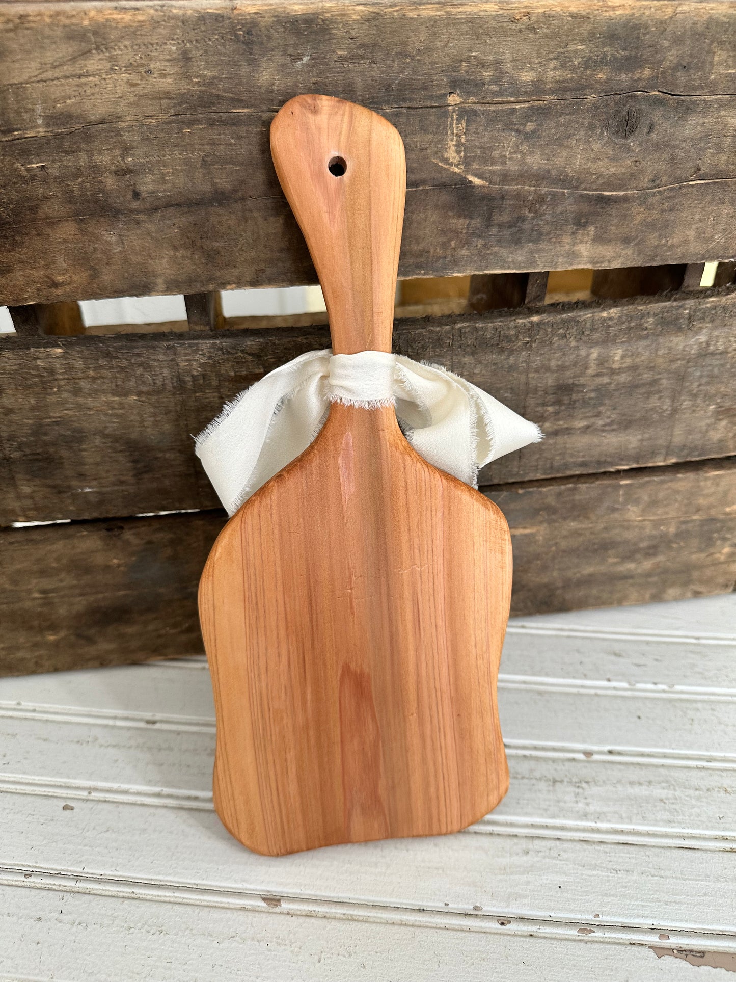 Handmade wood bread board with silver plate butter knife