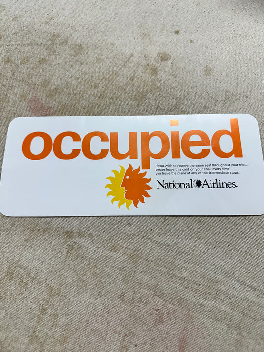 National Airlines Occupied sign